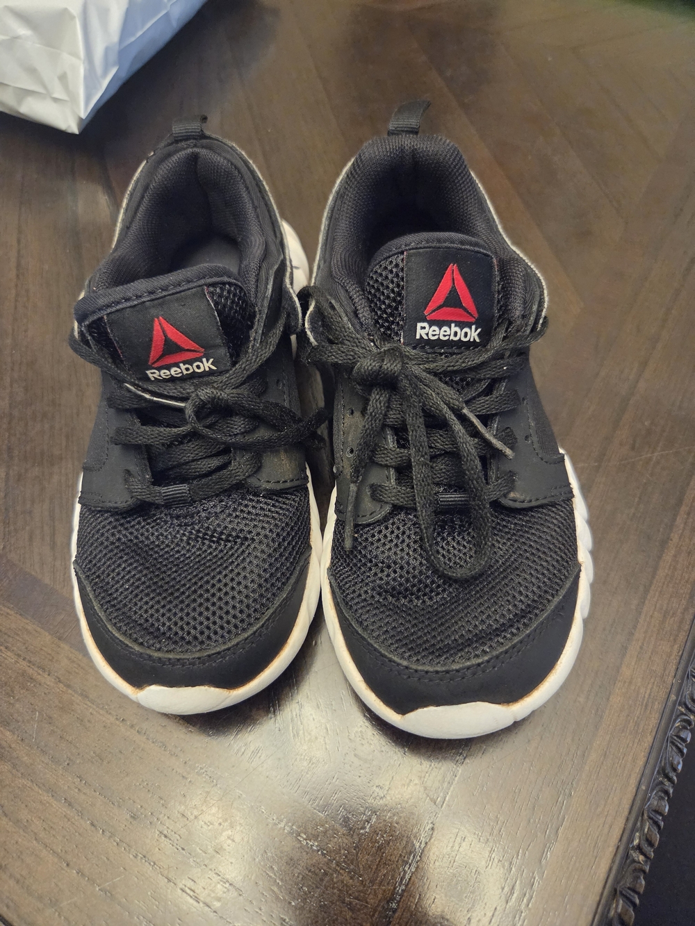 Reebok Kids Black Sneakers with Red Logo and White Soles
